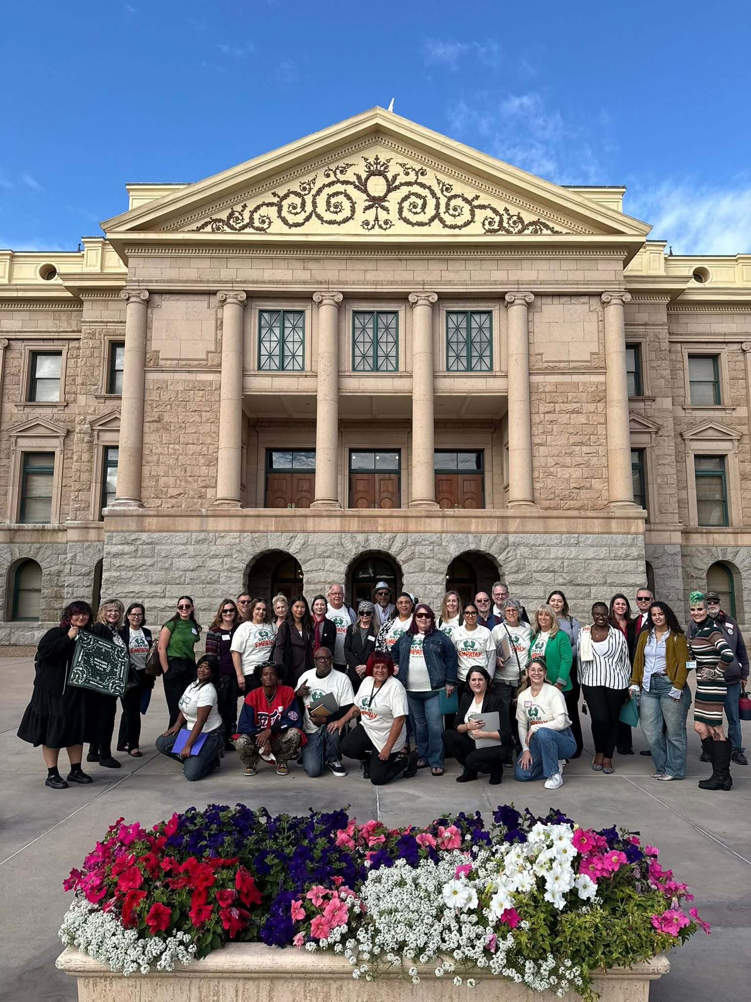 We Stand AZ advocates gathered on the Arizona State Capitol steps